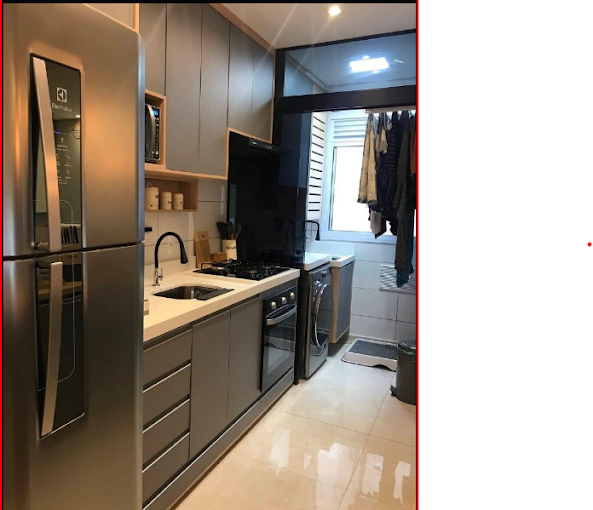 Cozinha compacta planejada em cinza com integração de lavanderia em Resende